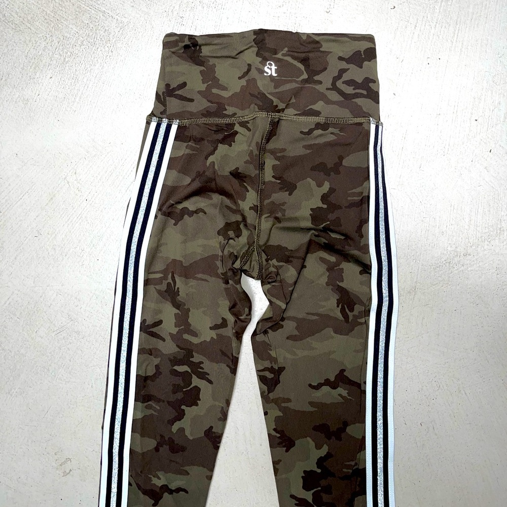 Strut This camo legging with black, white and sparkle silver stripes
